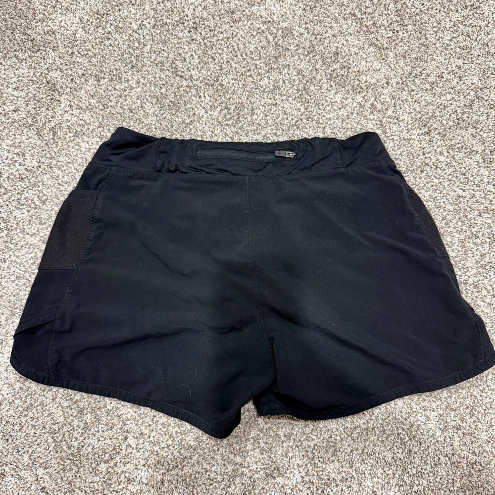 Black Athleta girls Record breaker 3” shorts with zipper and side pockets